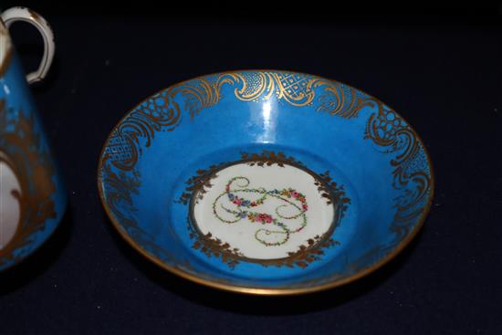 A Sevres style Madame de Genlis bleu celeste coffee can and saucer, a Sevres style coffee can and a Sevres Empire revival tea cup, al